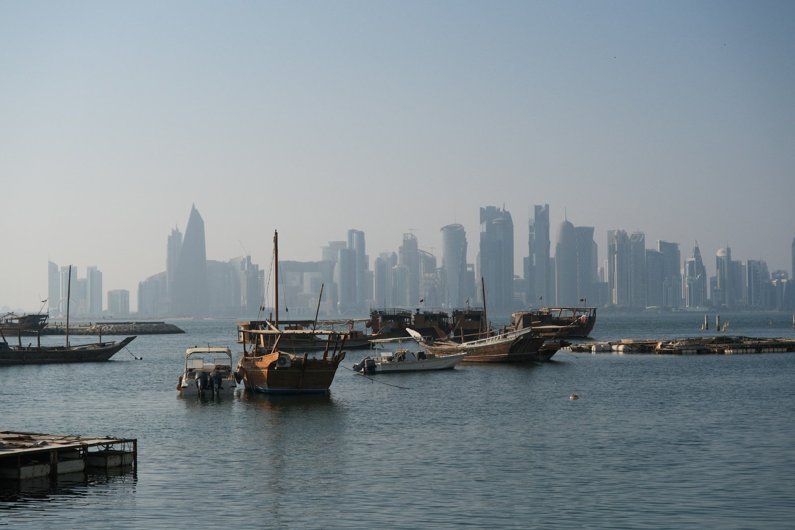 Home Traditional dhows in Dubai with the city skyline